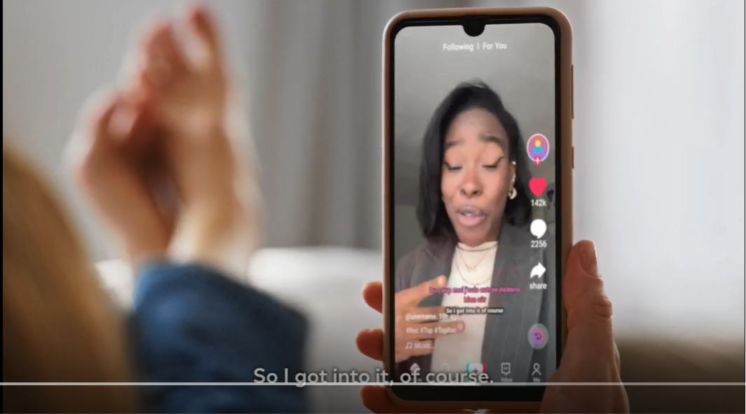 A creator filming a Lorealistar mission on her phone